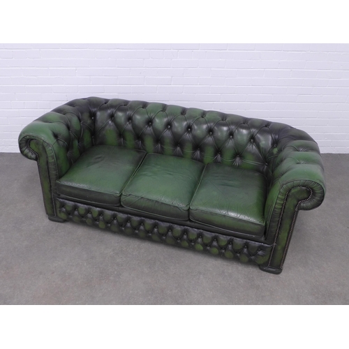 241 - Vintage green buttonback upholstered three seater chesterfield sofa, 200 x 70 x 60cm.