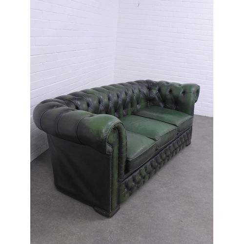 241 - Vintage green buttonback upholstered three seater chesterfield sofa, 200 x 70 x 60cm.