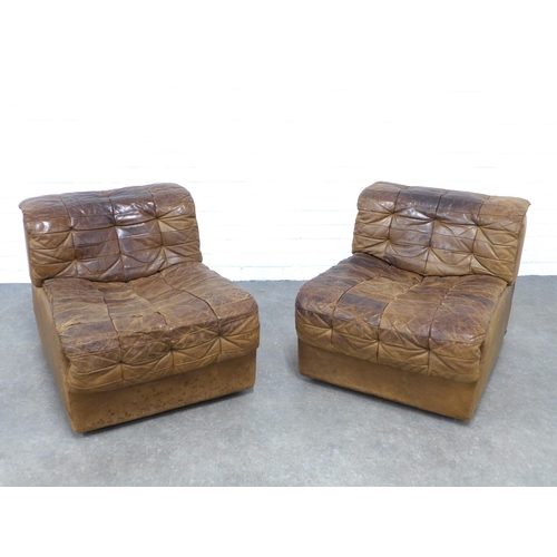 242 - A pair of vintage tan leather patchwork chairs, likely by De Sede, with clips to make a two seater, ... 
