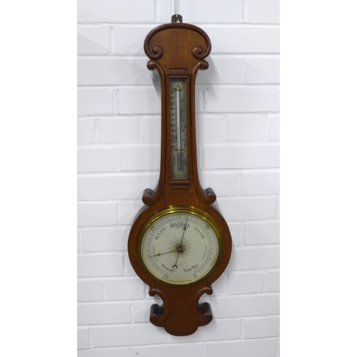 247 - An oak cased Negretti & Zambra, London NO.24448 barometer, with silvered thermometer,  28 x 86cm.