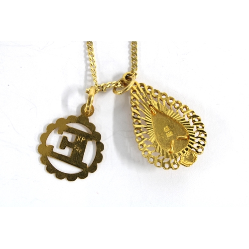 25 - Gold initial E pendant, stamped 22c together with an Arabian pendant stamped 915 on a 9ct gold chain... 