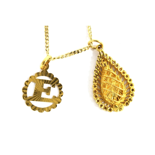 25 - Gold initial E pendant, stamped 22c together with an Arabian pendant stamped 915 on a 9ct gold chain... 