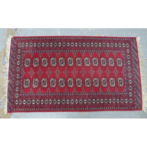 250 - Pakistan Bokhara rug with red field, 170 x 95cm.