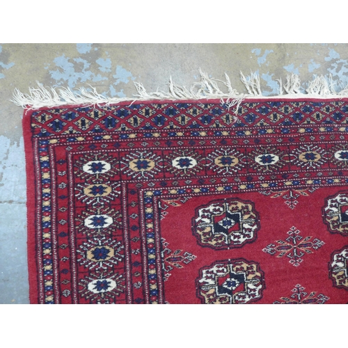 250 - Pakistan Bokhara rug with red field, 170 x 95cm.