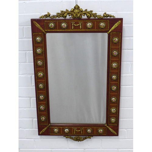 260 - An ornate reproduction wall mirror, parcel gilt with faux porcelain plaques, 54 x 88cm.