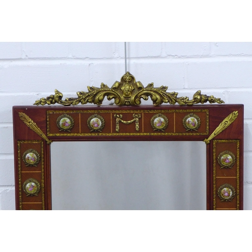 260 - An ornate reproduction wall mirror, parcel gilt with faux porcelain plaques, 54 x 88cm.