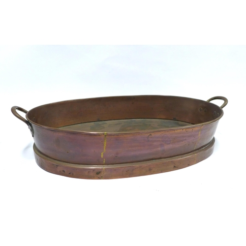 261 - A large copper pan, oval with handles, late 19th century, 58 x 34cm.