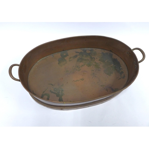 261 - A large copper pan, oval with handles, late 19th century, 58 x 34cm.