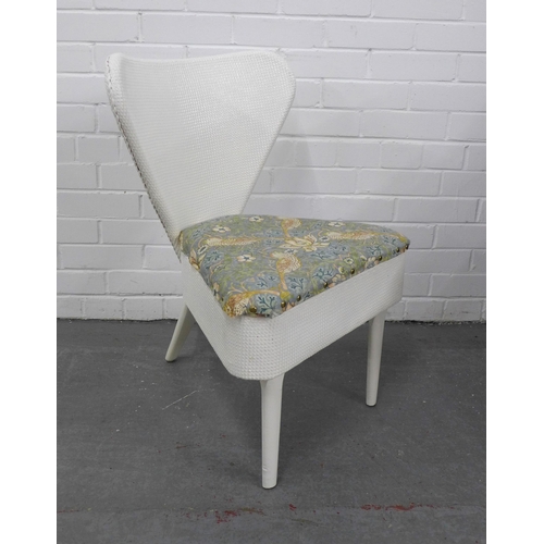 262 - Lloyd loom style three legged chair with lift up seat 53 x 75cm.