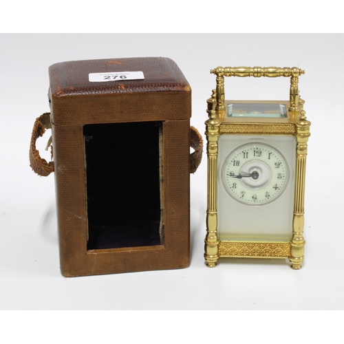 276 - Brass and glass cased carriage clock, 14cm, in leather carry case