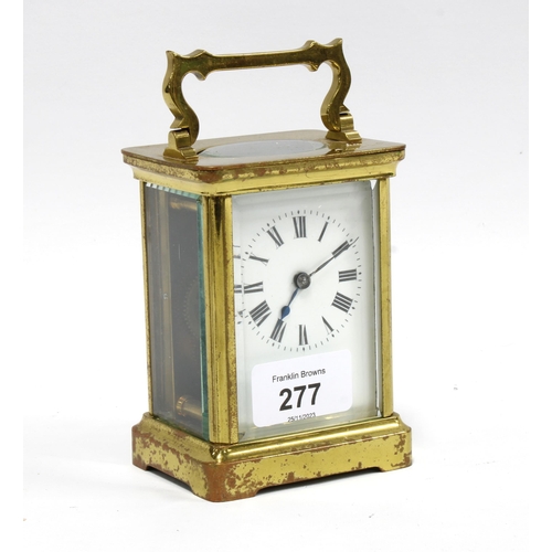 277 - A small brass and glass cased carriage clock, 14cm