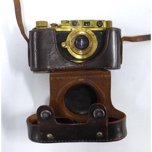 295 - Replica camera marked Leica Bildberichter No. 15617, with leather carry case