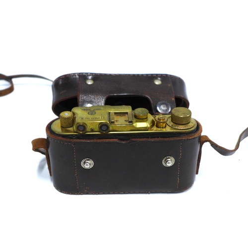 295 - Replica camera marked Leica Bildberichter No. 15617, with leather carry case