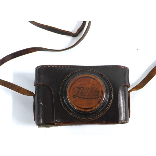 295 - Replica camera marked Leica Bildberichter No. 15617, with leather carry case