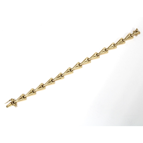 31 - 9ct gold bracelet with stylised triangular links, Chester 1956