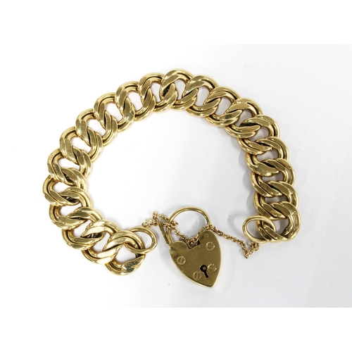 33 - Vintage 9ct gold bracelet with a 9ct gold heart padlock