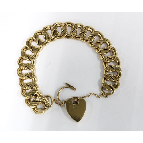 33 - Vintage 9ct gold bracelet with a 9ct gold heart padlock