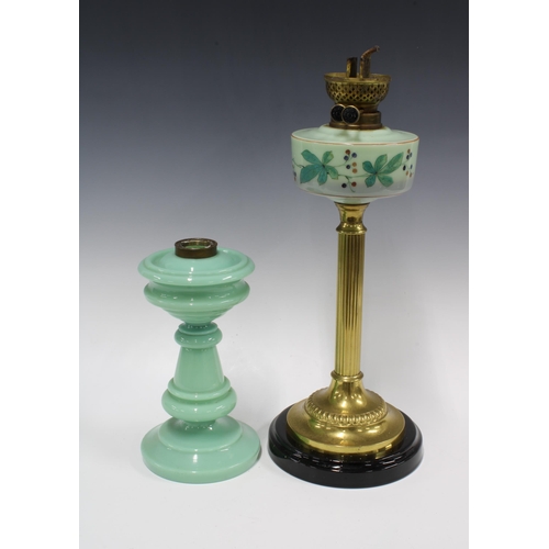 340 - Brass corinthian column oil lamp with green glass well, 47cm, together with a smaller green glass la... 