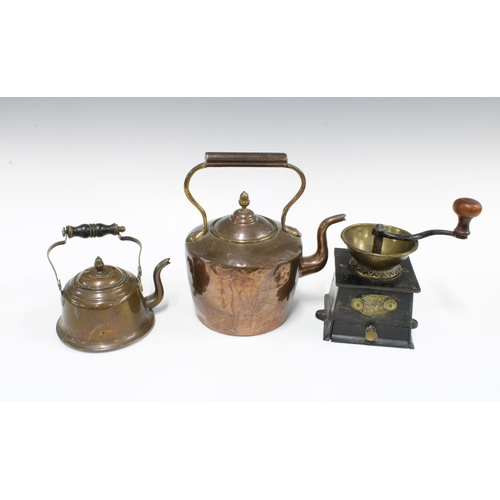 349 - Copper kettle, 22cm, together with another smaller and an iron and brass Kendrick coffee grinder (3)