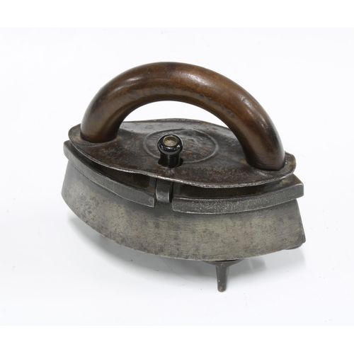 356 - Siddon's steel box iron with trivet stand, 18 x 13cm