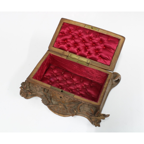 361 - Swiss carved eidlelweiss wooden box with red silk interior, 25 x 15cm