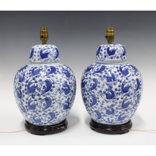 362 - Pair of blue and white table lamps with carp pattern, 38cm (2)