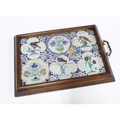 363 - Six Dutch faience tiles, in a tray setting, 46 x 33cm