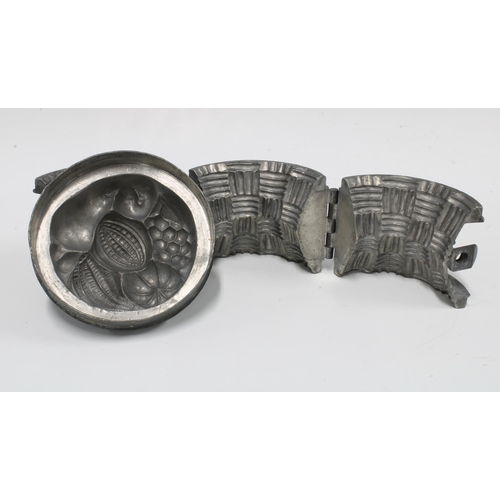 381 - 19th century pewter ice cream mould in the form  of fruit in a basket, 13cm