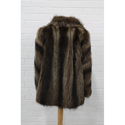 400 - Three quarter length brown fur jacket with embroidered lining