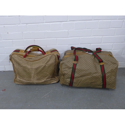 408 - A collection of vintage Gucci monogrammed weekend travel bags together with a vintage Gucci tote sho... 