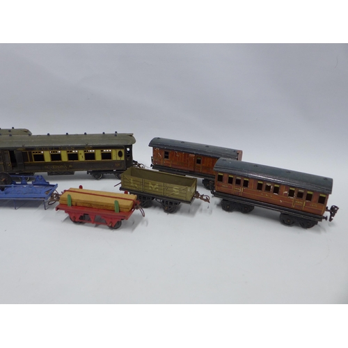 411 - A collection of vintage Hornby carriages and accessories to include Pullman Verona, etc (8)