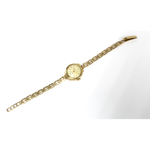 49 - 9ct gold Levicta ladies wristwatch with circular champagne dial with arabic numerals and subsidiary ... 
