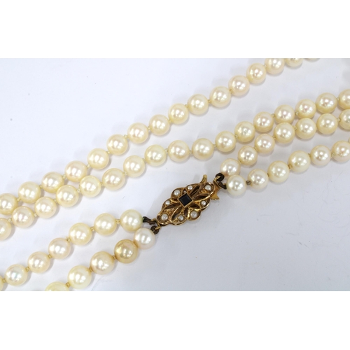 6 - Double strand pearl necklace with a 9ct gold sapphire and seed pearl clasp, Birmingham 1975