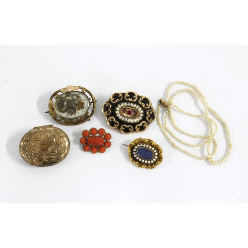 62 - Victorian yellow metal brooches to include two seed pearl brooches, coral brooch and another with dr... 