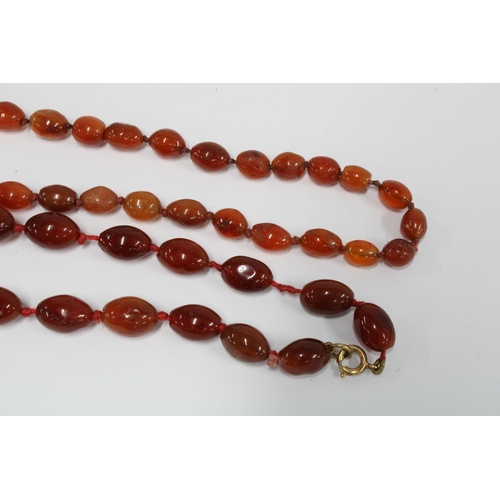 63 - Three strands of vintage coloured glass and hardstone beads, (3)