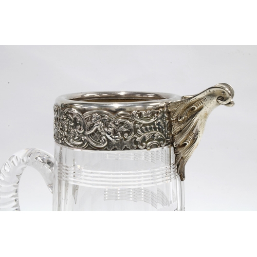 66 - Victorian cut glass lemonade pitcher or water jug, with silver mounts by William Comyns & Sons, Lond... 