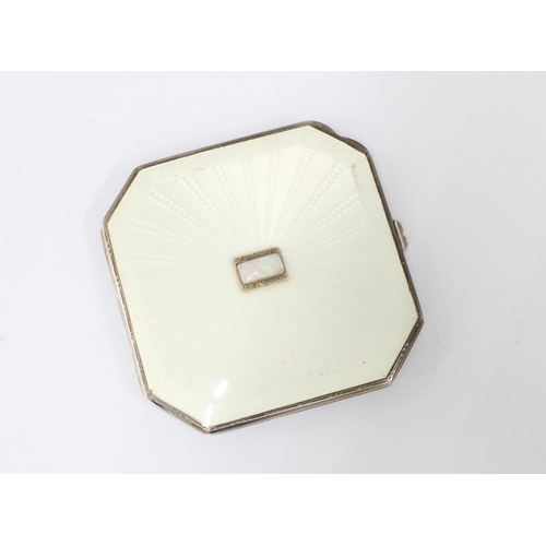 7 - An Art Deco silver and white guilloche enamel powder compact, Birmingham 1936, the hinged lid with a... 
