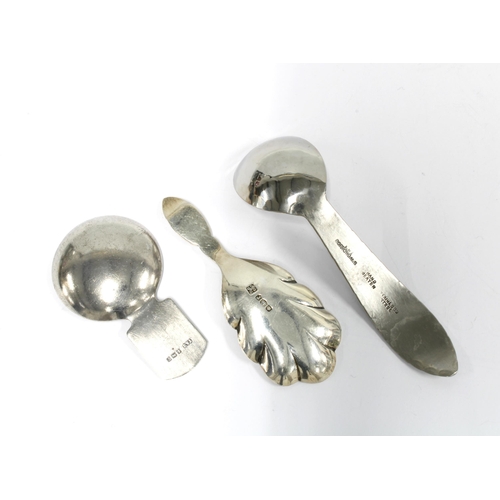 74 - George V silver caddy spoon, Sheffield 1934, a London silver caddy spoon and a Borrowdale Arts & Cra... 