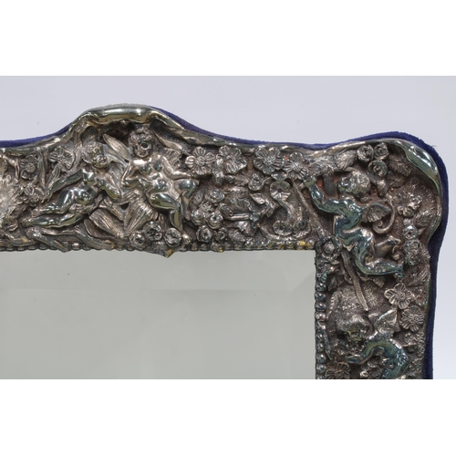 76 - An Art Nouveau style Britannia standard silver mirror, London 1998, rectangular form with embossed c... 