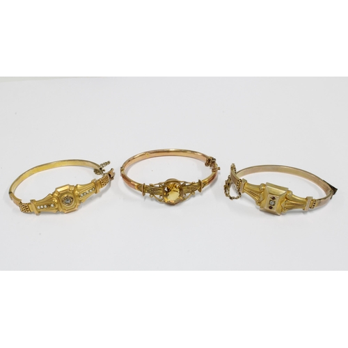 83 - Two Victorian unmarked yellow metal bracelets together with another damaged bangle (3)