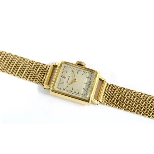 15 - Movado, a lady's 18ct gold wristwatch with signed champagne dial with baton markers, on an 18ct gold... 