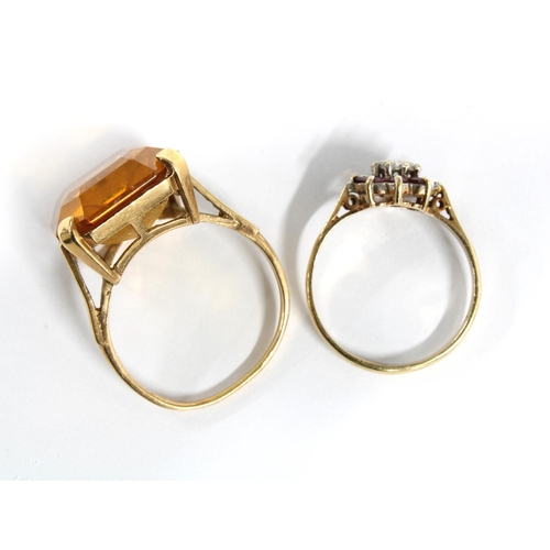 29 - 9ct gold dress ring with a large claw set citrine, stamped 9ct and approx. size R, together with a 9... 