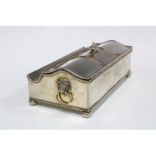 380 - Silver plated desk inkstand, rectangular form with a serpentine lid and pen tray, with beaded edge d... 