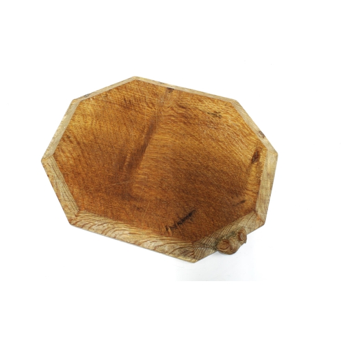 388 - Workshop of Robert Mouseman Thompson oak bread board, octagonal form with carved mouse signature, 30... 