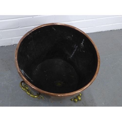 425 - Copper and brass coal bucket on paw feet,  40 x 31cm.