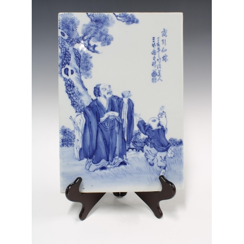 431 - 20th century Chinese blue and white porcelain plaque, rectangular form, painted with an edler and a ... 