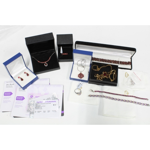 49 - A collection of silver gemset jewellery to include bracelets, earrings, necklaces and rings together... 