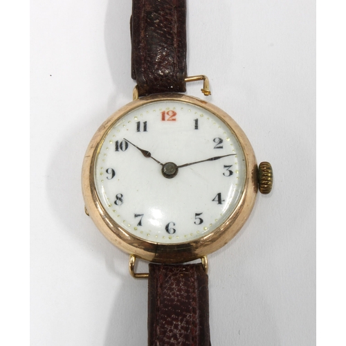 49J - Early 20th century 9ct gold cased wristwatch, circular dial with Arabic numerals and red No.12, on a... 