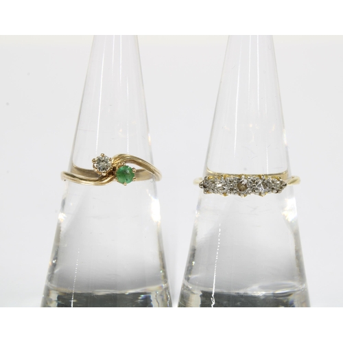 54 - 9ct gold diamond and emerald crossover ring, London 1980 and size K, and an early 20th century five ... 