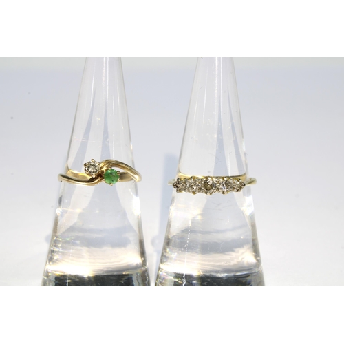 54 - 9ct gold diamond and emerald crossover ring, London 1980 and size K, and an early 20th century five ... 